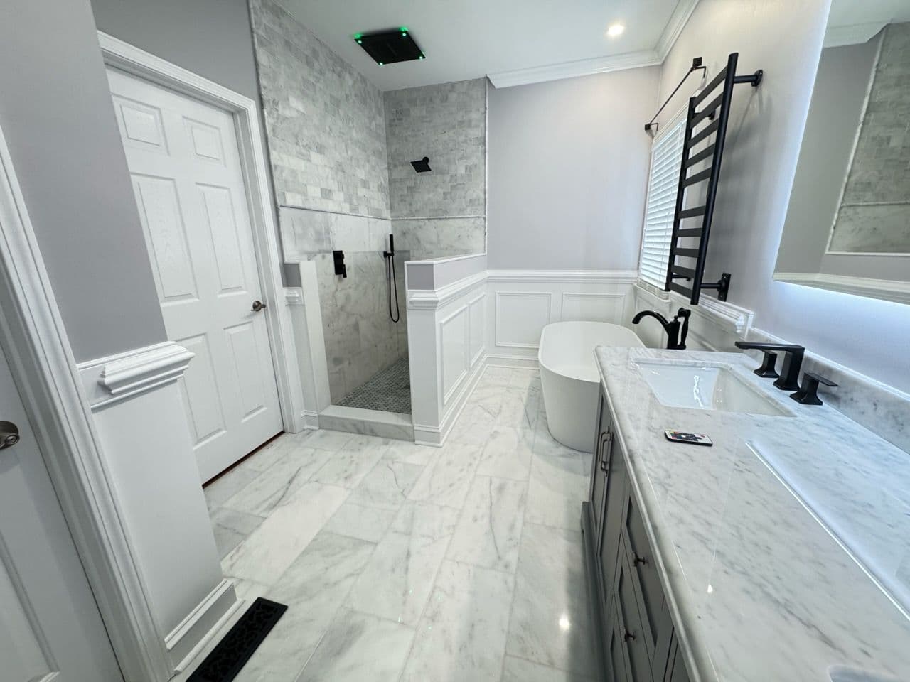 Spacious Bathroom Transformation with Elegant Tilework