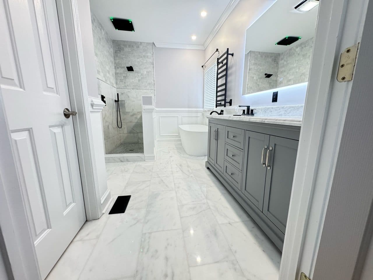 Spacious Bathroom Transformation with Elegant Tilework